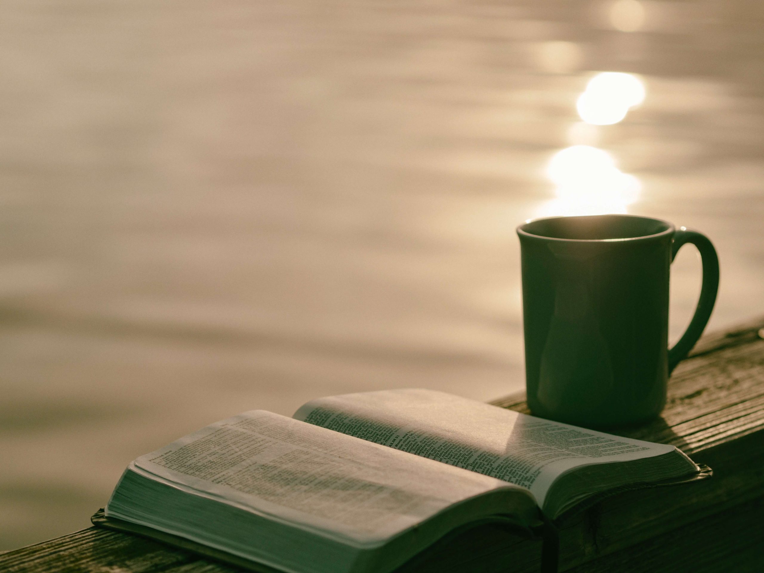 Calm ocean with a sunset – symbolizing unshakable peace and serenity through faith.